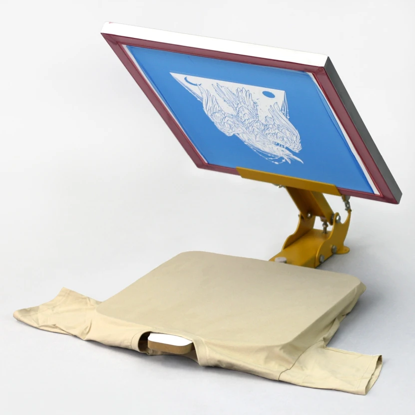stretching T-shirt on printing table